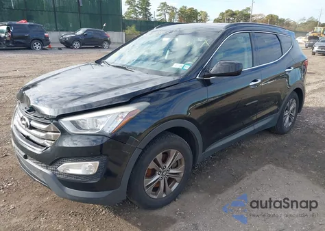 2014 Hyundai Santa Fe Sport 2.4L z USA, uszkodzony, nr VIN 5XYZU3LBXEG127527